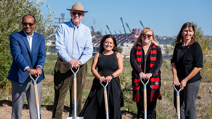 SDSU leaders and partners pose with shovels at the December 2025 groundbreaking for the One Water Lab, a hands-on water science learning center.